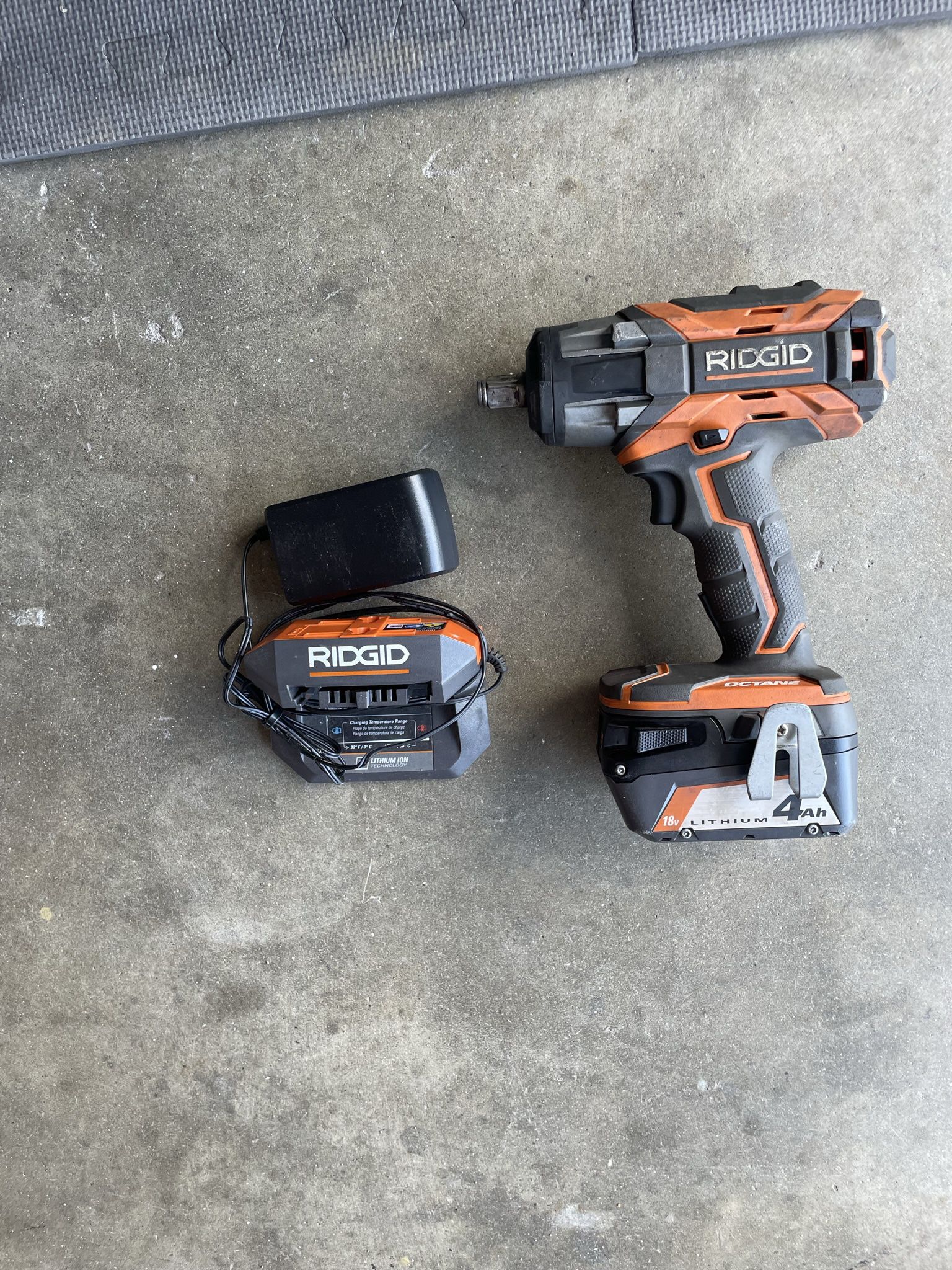 Rigid 1/2 Mid Torque Impact Wrench Charger And Battery Included 