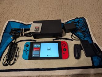 Nintendo Switch with Accessories and Monster Game