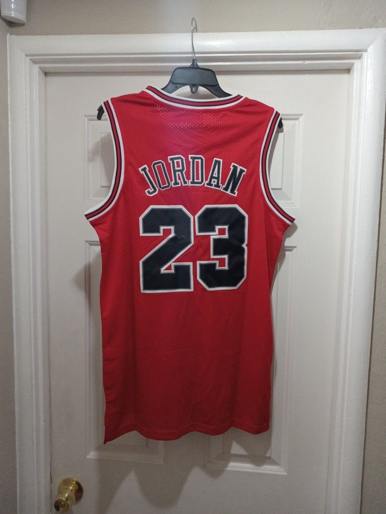 BULLS. ANY 2 JORDAN JERSEYS $75