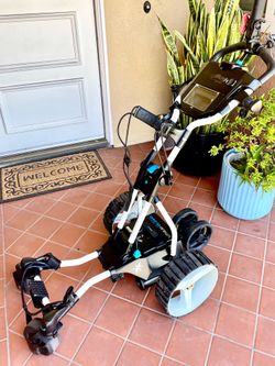 Electric remote control golf cart (BagBoy by MGI)comes with lithium battery with charger,remote control with charger,2 cup holder,umbrella holder and 