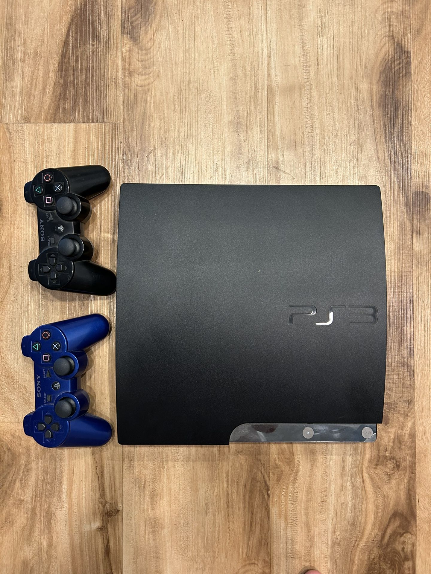 PlayStation 3 (PS3) + 2 Controllers And Cables 