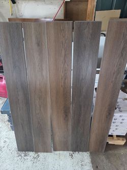 28 Boxes of Style Selections Brunette Oak LVP $35/Box