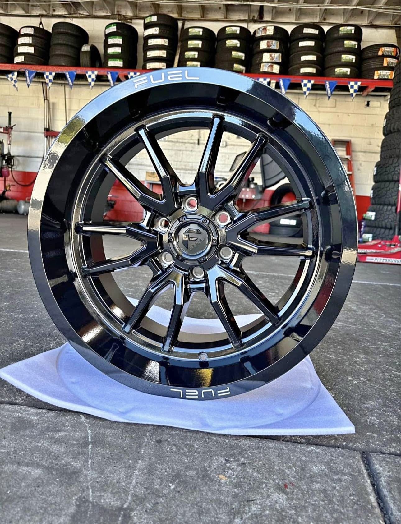 fuel clash 20x10 6x139.7 -18 gloss black with 33x12.50R20 mud tires available in stock we finance