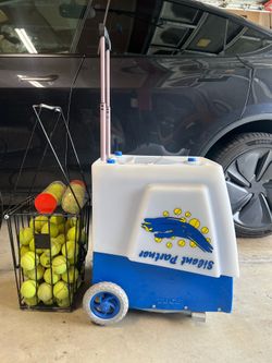Tennis head ball basket