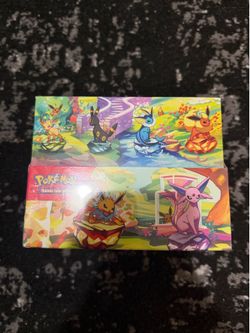Pokemon Prismatic Evolutions Sealed Tin Display