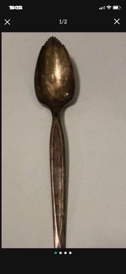 Vintage W.M. Rogers Silver Serrated Grapefruit Spoon