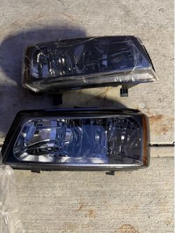 2003 - 2006 Chevy Silverado 2pc headlights smoke / amber Luces micas 2 piezas oscuras