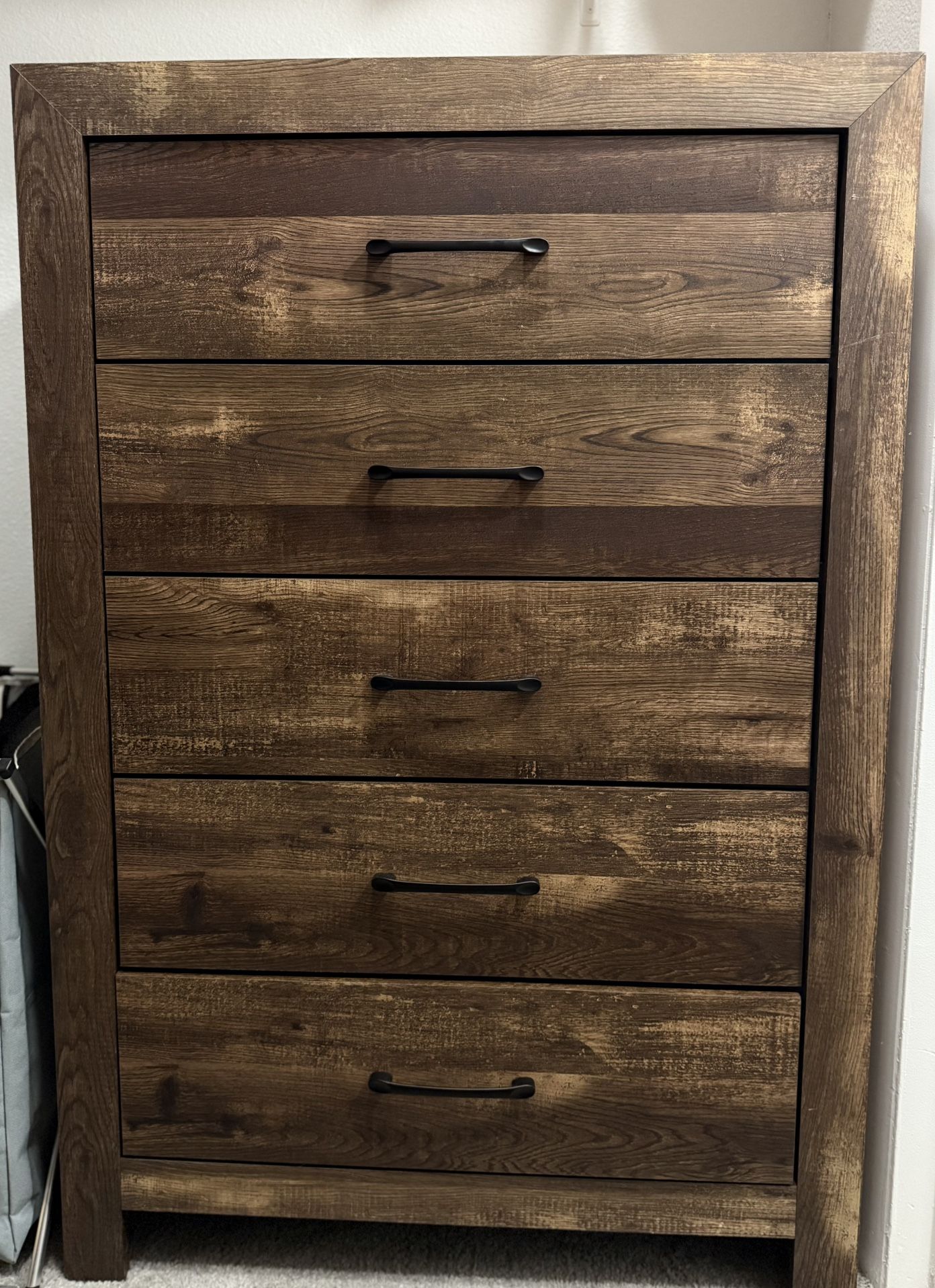 Signature Design by Ashley Trinell 5 Drawer Wood Chest in Brown