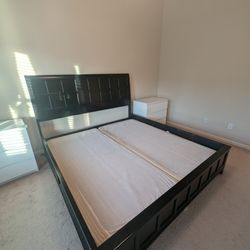 Used king-size bed frame with matching box.
