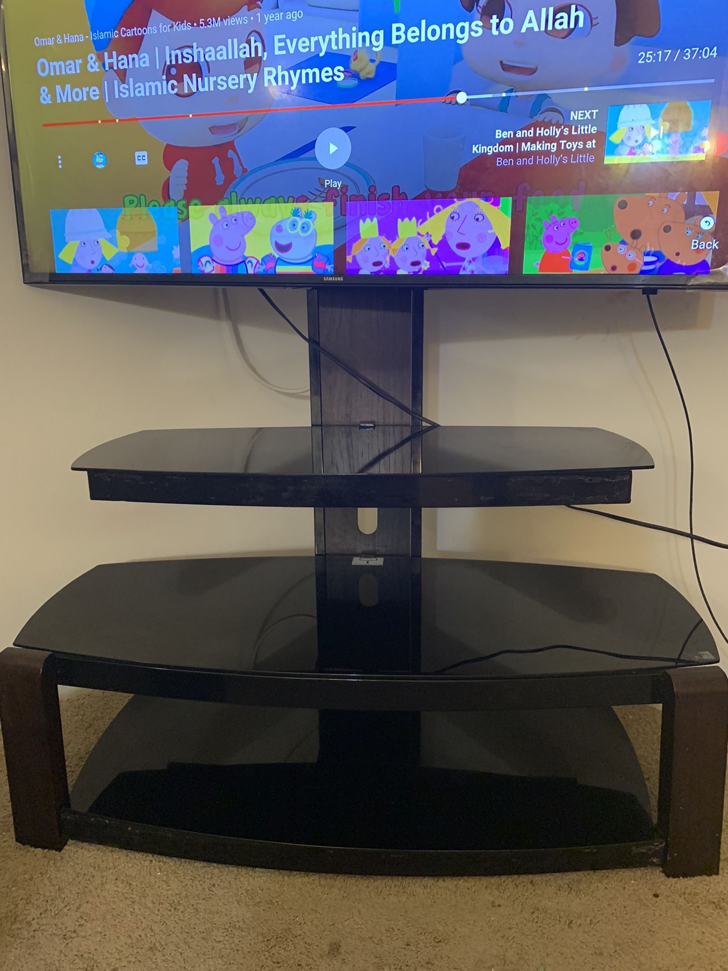 Glass tv stand (tv is not included )