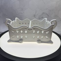 Vintage white porcelain divided sugar/tea bags holder with reticulated cutouts and ornate handles. 