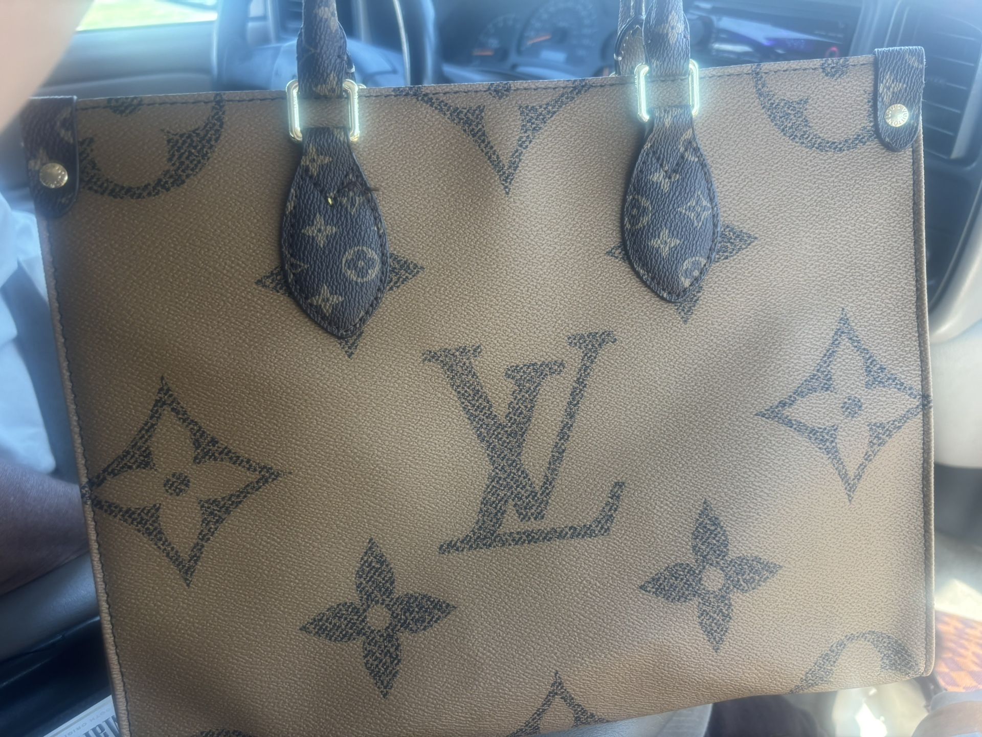 Bag by Louis Vuitton