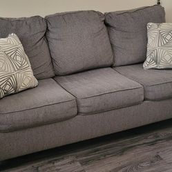 2-Piece Set: Ashley Furniture Sofa & Armchair - "Agleno" Line in Charcoal Grey w/ 3 Throw Pillows