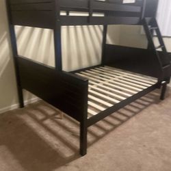 Twin/full bunk bed. $350 bunk only. $550 with mattresses. Assembly required. Assembly not included. Tax included. Free local delivery.