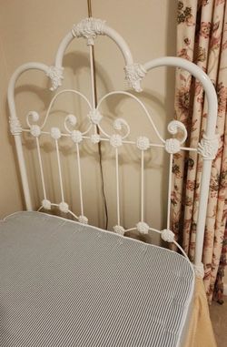Vintage twin headboards with cast iron platform bed. Orthopedic mattress available free. Nice!! $265 obo