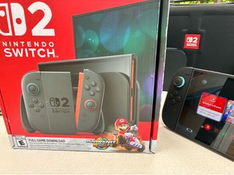 Nintendo Switch 2 with Mario Kart World and case