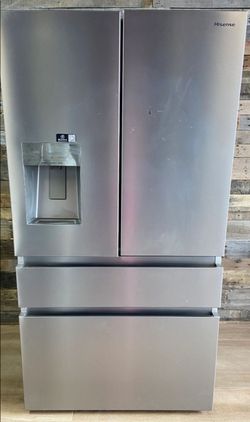 STAINLESS STEEL 4 DOOR REFRIGERATOR WITH ICE MAKER AND WATER DISPENSER ON DOOR,  ALMOST NEW....$ 600