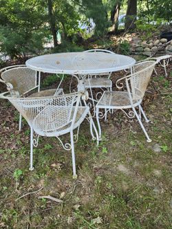 Cast Iron Table With 4 Chairs  