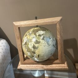 Globe with a wooden stand