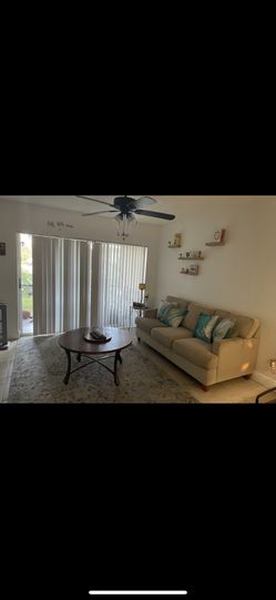 Beige living room couch Bed