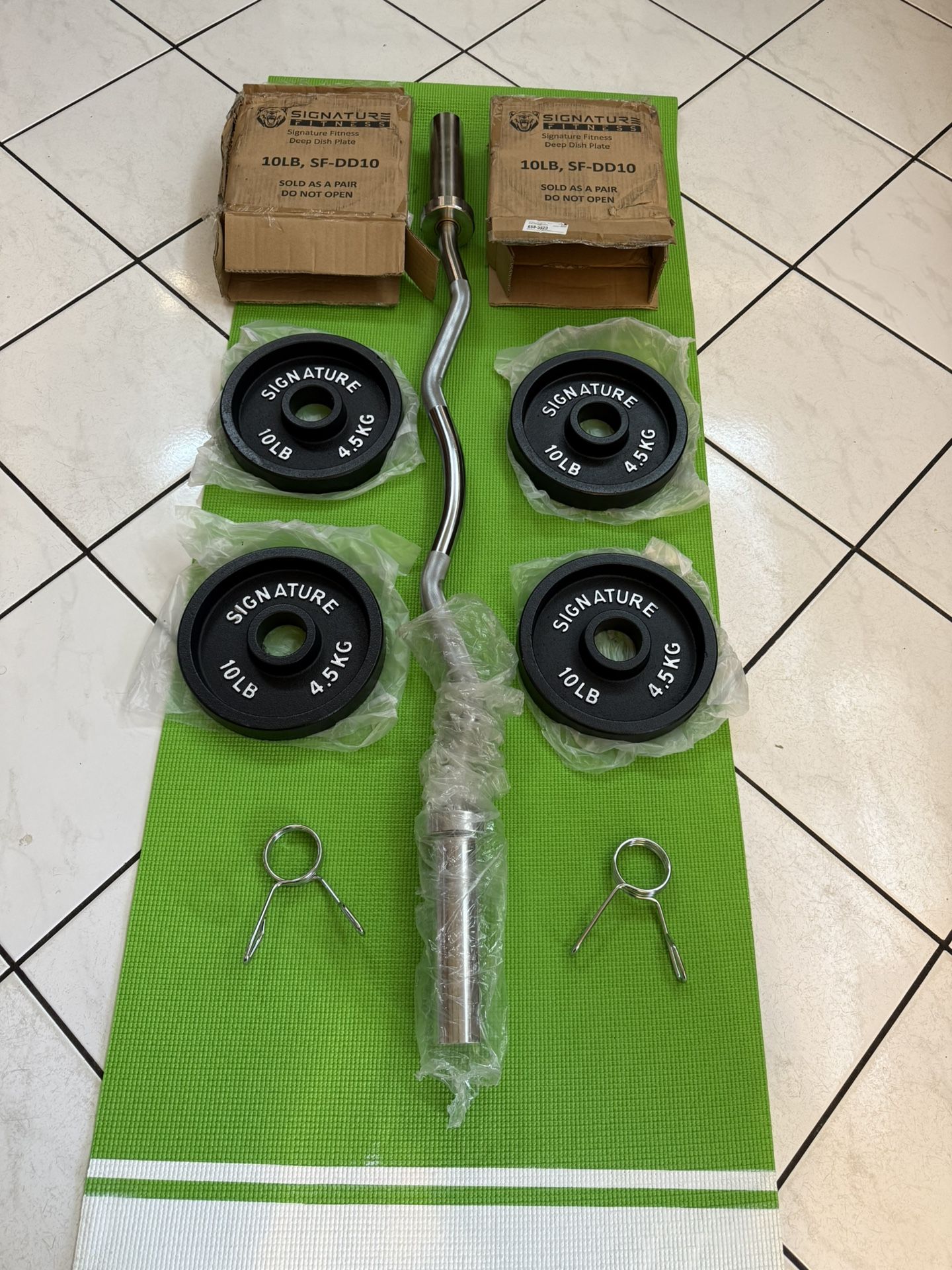 New Olympic Curl Bar And Olympic Deep Dish Weights