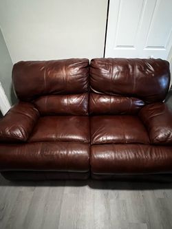 Brown Leather Manual Reclining Loveseat