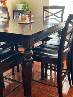 Used dining table with 6 chairs