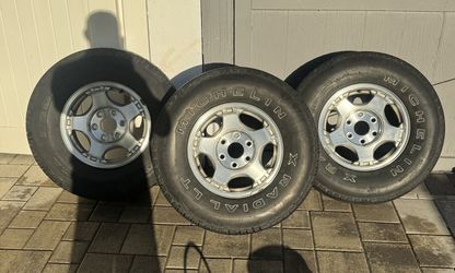 Three tires with aluminum discs 265/75 R16
