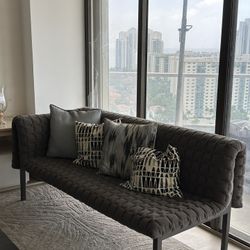 Brown Quilted Couch With Pillows 