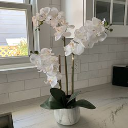 Faux white orchid with marble vase