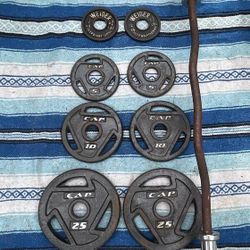 SET OF EASY GRIP CAP OLYMPIC PLATES  :  (PAIRS OF)  25s  10s  5s  2.5s  PLUS  OLYMPIC CURL BAR 