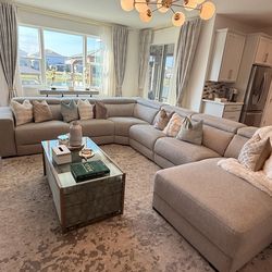 Large sectional with adjustable headrest with recliner seat/ coffee table/ 2 ottomans and swivel Chair