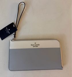This is a Kate Spade New York Lucy Colorblock Medium L-Zip Wristlet in the platinum grey multi colorway, featuring textured Saffiano leather with a ch