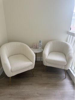 2 white accent chairs