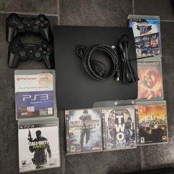 Sony Playstation 3 With 7 Games And 2 Controllers