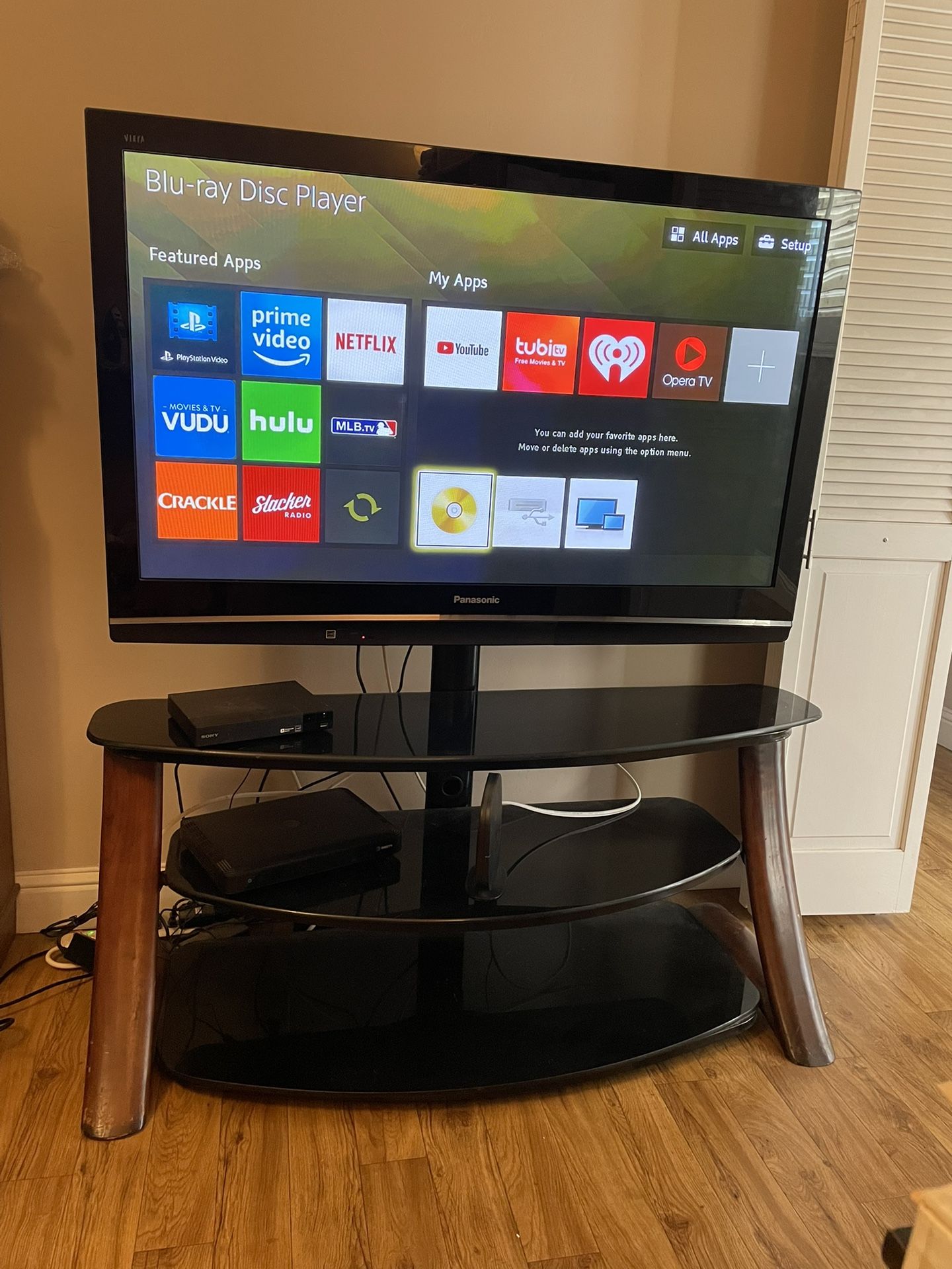 PANASONIC 42” TELEVISION ON STAND.