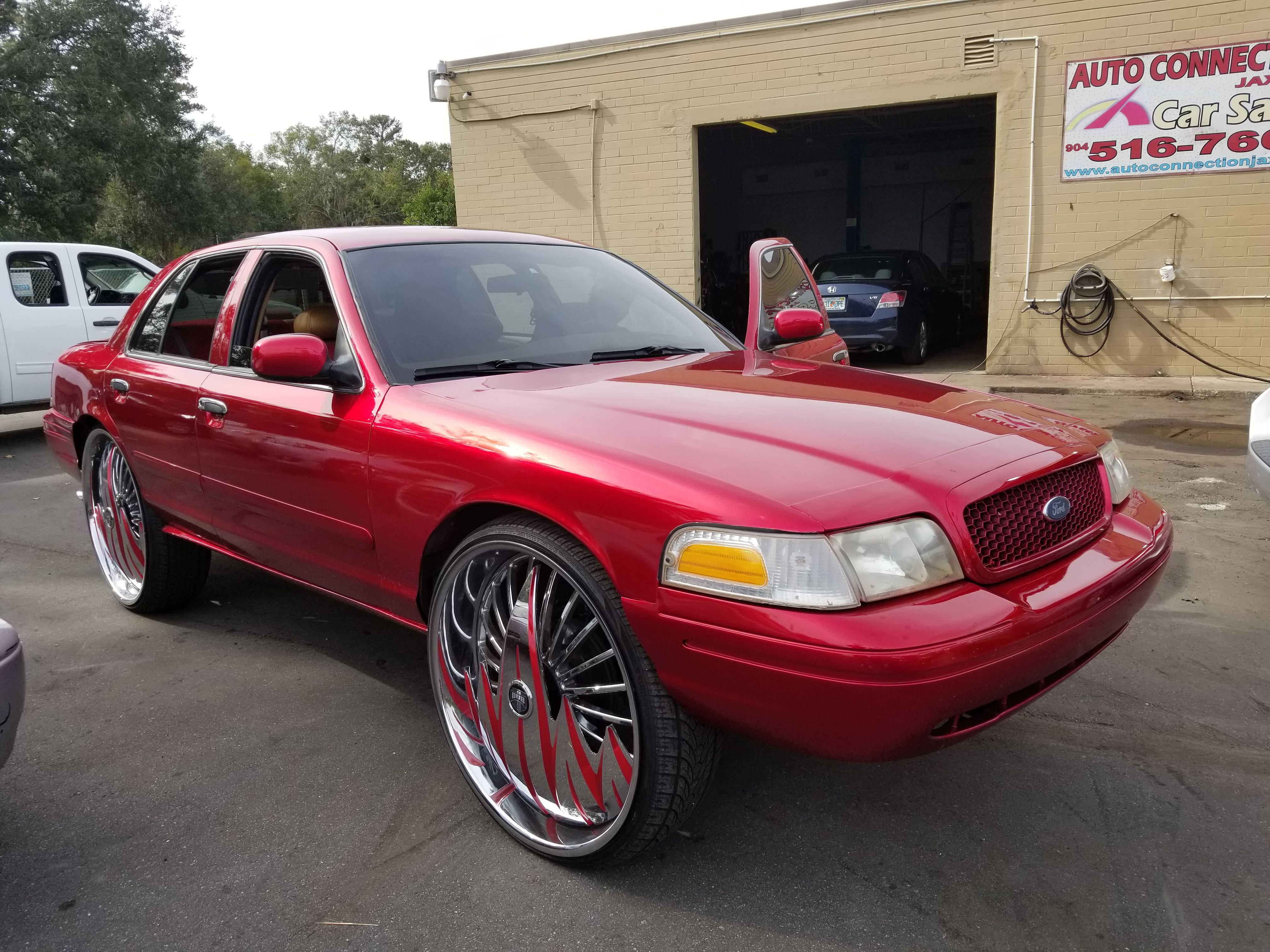 FS Fully custom Crown Vic on dubs floaters 30 inch wheels