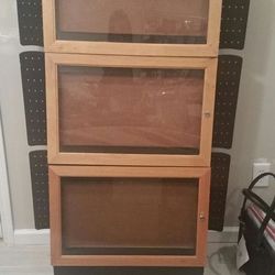 Rolling display/storage cabinet approximately 5ft. $60 *contents NOT included*