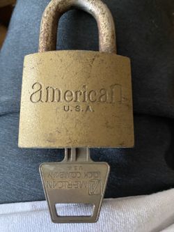 Vintage American Lock Company padlock with its matching key. 