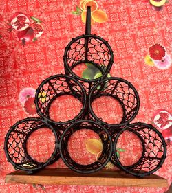 Cast metal and wood wine rack - yarn holder - organizer home decor