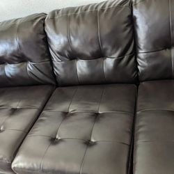 2 Piece Leather Sectional Couch.  No Pets .No Smoking On It 