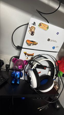 Ps5 with bear and headphones