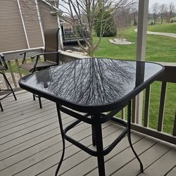 Glass bar height table for Outdoors OBO