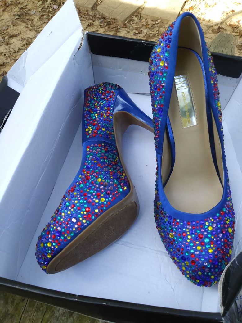 Womens shoes size 7.5. International concepts I.N.C. Very light ware on The bottom due to trying on.