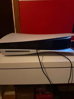 PlayStation 5 with controller