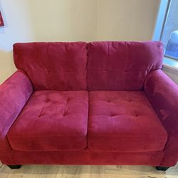 Barn red velvet love seat