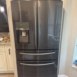 Samsung Refrigerator, Microwave, Oven. Frigidaire Dishwasher. 