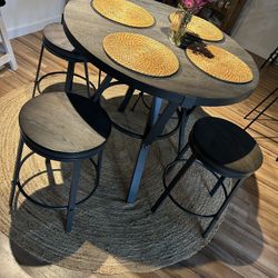 Table And Stools 