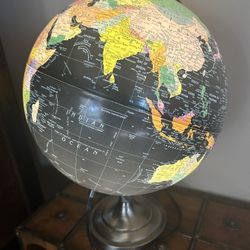  The Orion desktop globe features a 12" black ocean illuminated globe with political map styling's mounted on a silver finish steel stand with semi-me