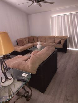 Sofas, tables,lamps, and rug
